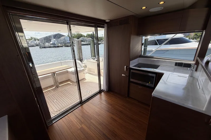Slide: The Image of Modern yacht interior with kitchen and deck view, Princess F50, 2027 model. - 70