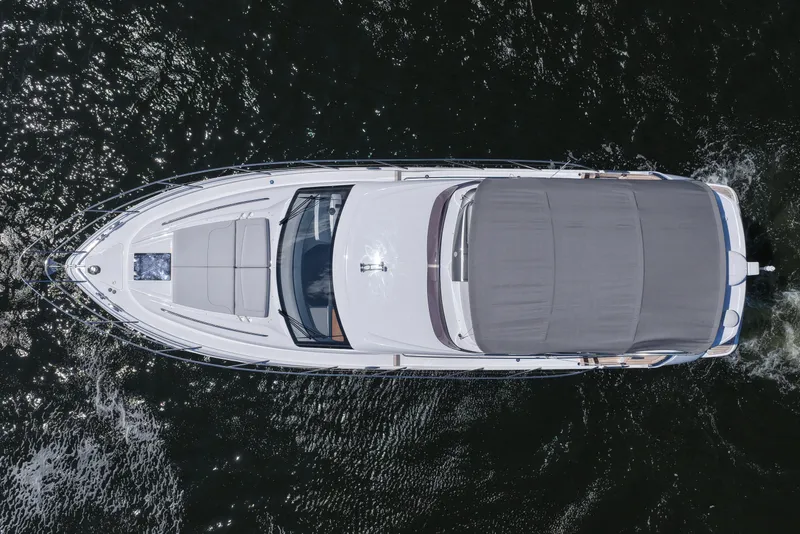 Slide: The Image of Top view of a 2027 Princess F50 yacht cruising on water. - 18