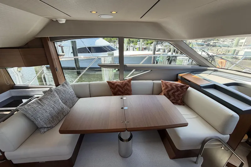 Slide: The Image of Luxurious interior of 2027 Princess F50 yacht with elegant seating and table. - 82