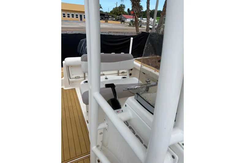 Slide: The Image of 2017 Robalo R222 Center Console boat interior with seating and controls. - 18