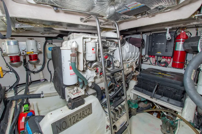 Slide: The Image of Engine room of a 2008 Sea Ray 47 Sedan Bridge yacht, showcasing machinery and equipment. - 56