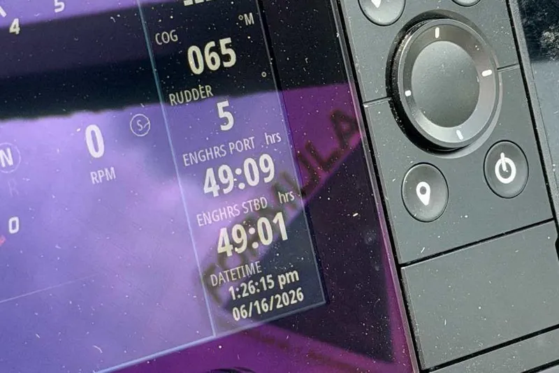 Slide: The Image of Close-up of a 2022 Formula 290 Bowrider dashboard display showing engine hours and date. - 11