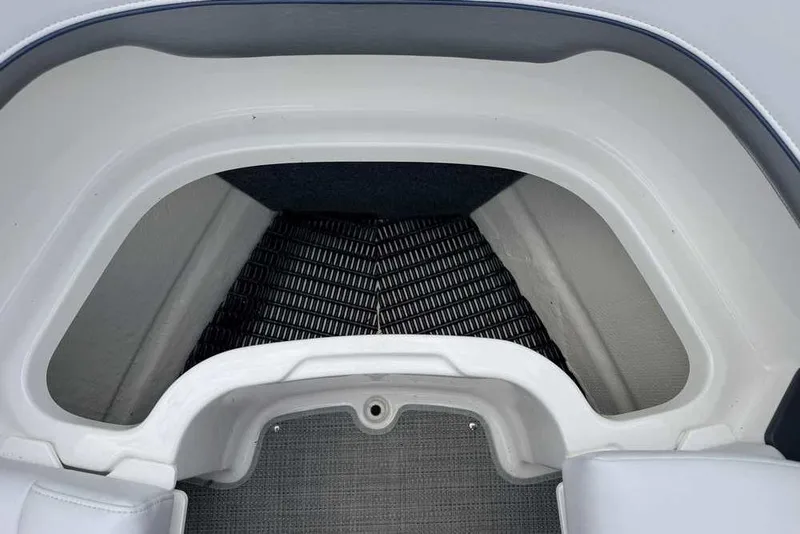 Slide: The Image of Interior view of a 2022 Formula 290 Bowrider boat storage compartment. - 22