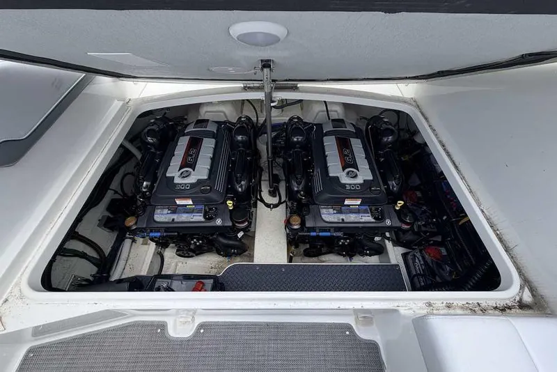 Slide: The Image of 2022 Formula 290 Bowrider engine compartment with dual 300 horsepower engines. - 24