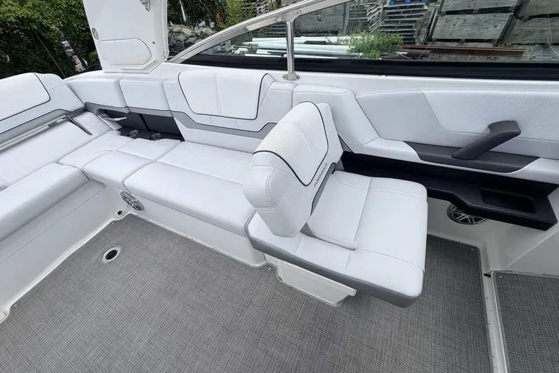 Slide: The Image of 2022 Formula 290 Bowrider interior with white seating and modern design. - 6