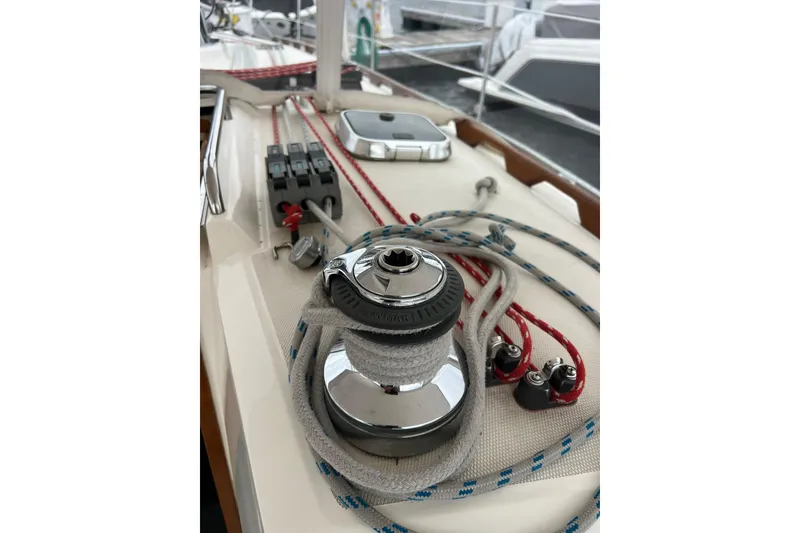 Slide: The Image of Close-up of a 1998 Sabre 362 sailboat deck with winch and ropes. - 10