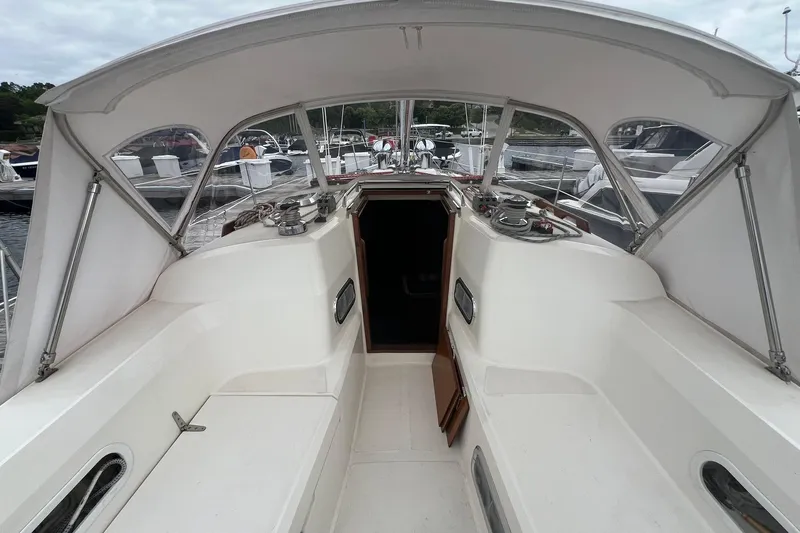 Slide: The Image of Cockpit of a 1998 Sabre 362 sailboat with canopy and marina view. - 16