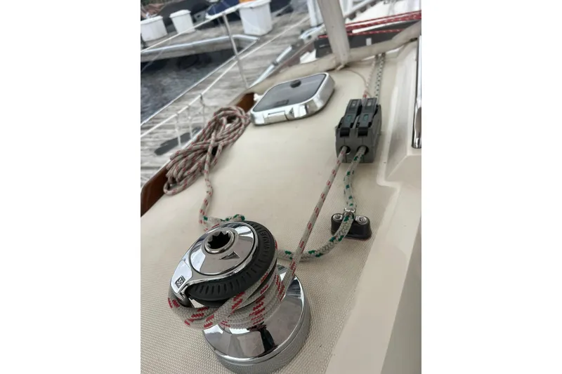 Slide: The Image of Deck of 1998 Sabre 362 sailboat with winch and ropes. - 9