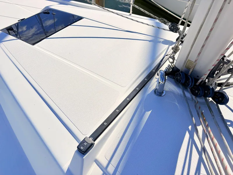 Slide: The Image of Close-up of a Hanse 348 yacht deck with ropes and fittings. - 18
