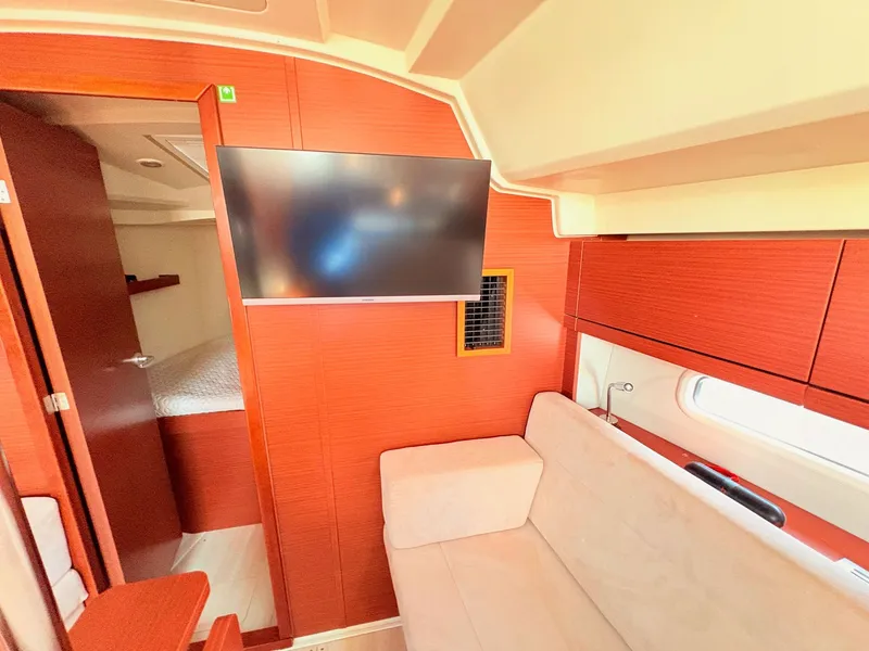 Slide: The Image of Interior of a modern yacht with a sofa and television. - 33