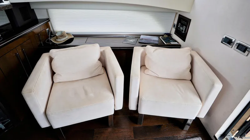 Slide: The Image of Luxurious interior of 2013 Marquis 500 Sport Bridge with two white armchairs. - 21