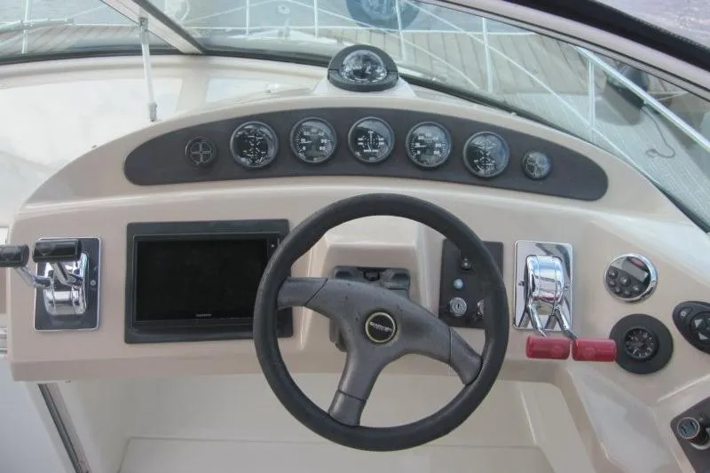 Slide: The Image of Helm of 2006 Carver 36 Mariner with steering wheel and instrument panel. - 39