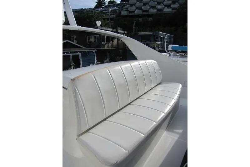 Slide: The Image of White leather seating on 2006 Carver 36 Mariner yacht deck. - 45