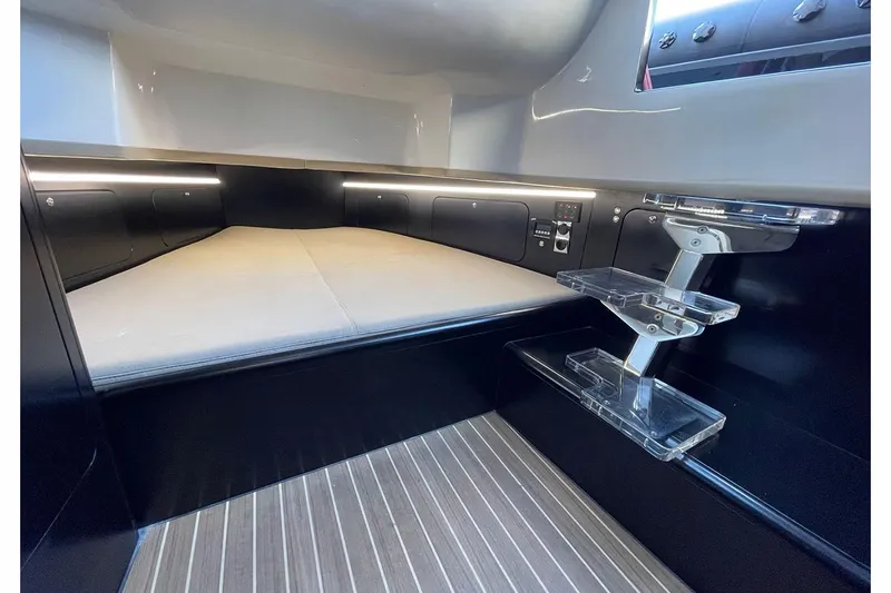 Slide: The Image of Manufacturer Provided Image: Modern interior cabin of 2023 Skipper-BSK 42NC boat with sleek design and LED lighting. - 16