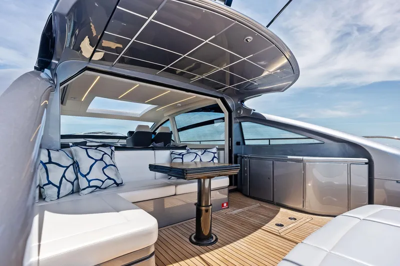 Slide: The Image of Luxurious 2023 Pershing 6X yacht interior with sleek design and comfortable seating. - 31