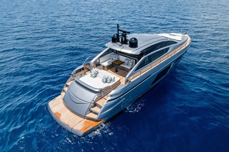 Slide: The Image of Luxurious 2023 Pershing 6X yacht cruising on open blue sea. - 65