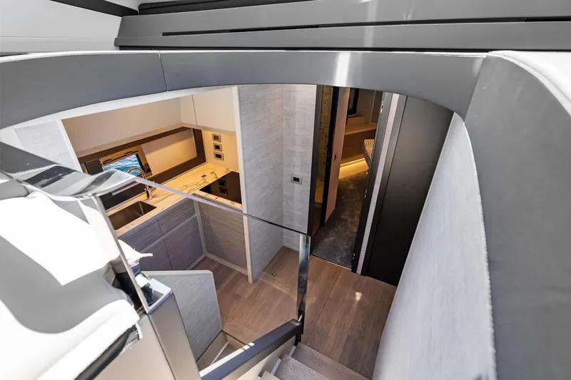 Slide: The Image of Interior view of 2023 Pershing 6X yacht, showcasing modern design and luxurious finishes. - 49