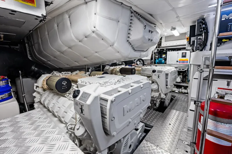 Slide: The Image of Engine room of 2023 Pershing 6X yacht with MAN engines and advanced equipment. - 63