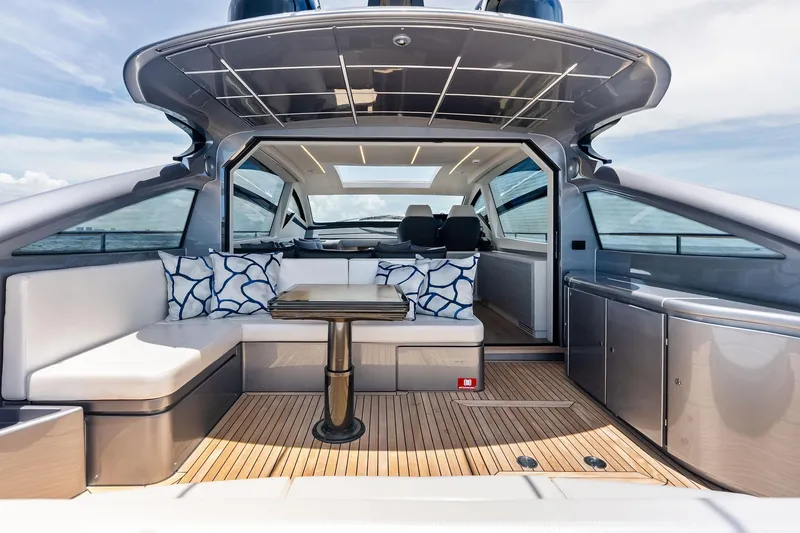 Slide: The Image of Luxurious 2023 Pershing 6X yacht interior with sleek seating and modern design. - 38