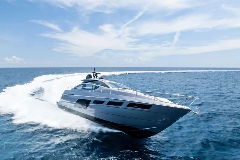 The Image of 2023 Pershing 6X yacht cruising swiftly on open ocean waters. - 0