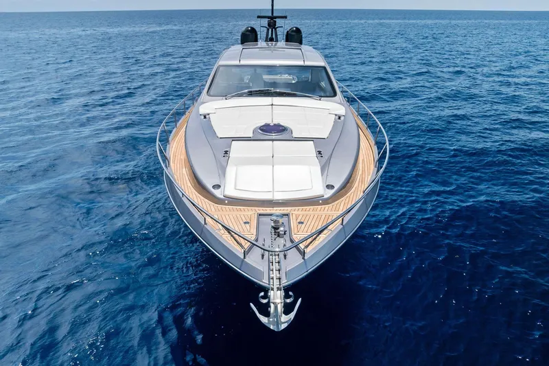 Slide: The Image of 2023 Pershing 6X yacht cruising on open blue sea, showcasing sleek design and luxury. - 66