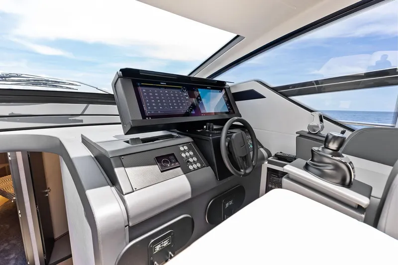 Slide: The Image of Modern cockpit of 2023 Pershing 6X yacht with advanced navigation system. - 27