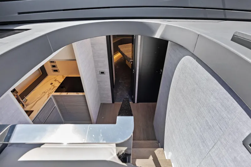 Slide: The Image of Interior view of 2023 Pershing 6X yacht, featuring modern design and luxurious finishes. - 55