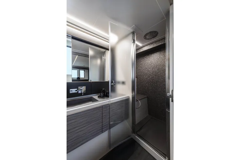 Slide: The Image of Modern bathroom interior of 2023 Pershing 6X yacht with sleek design and shower. - 15