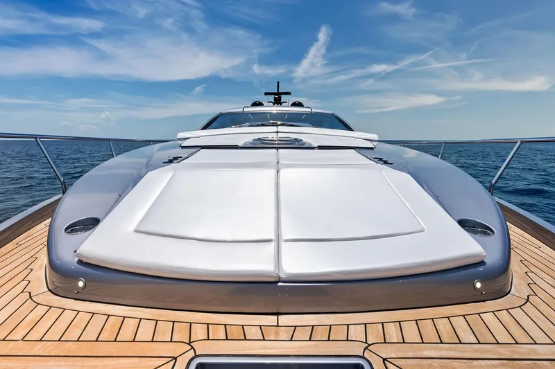 Slide: The Image of 2023 Pershing 6X yacht on open sea, showcasing sleek design and luxury deck. - 33