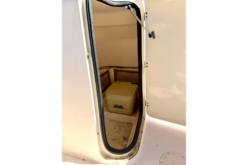 Slide: The Image of Interior storage compartment of 2005 Grady-White Freedom 225 boat. - 12
