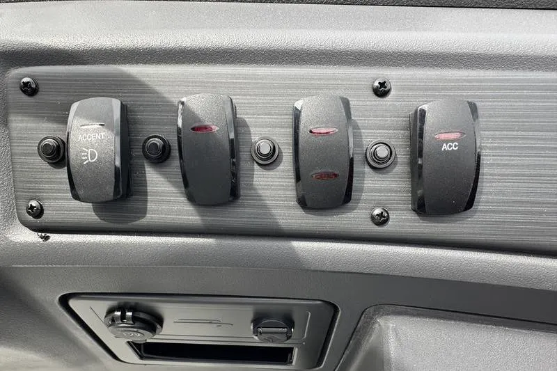 Slide: The Image of Dashboard switches of a 2027 Bennington S Quad Bench 20 SSR boat. - 28