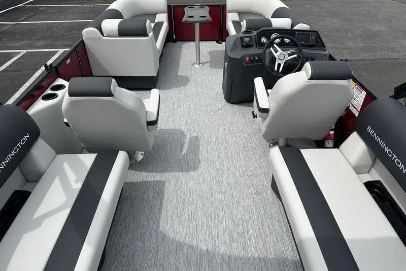 Slide: The Image of Interior of 2027 Bennington S Quad Bench 20 SSR pontoon boat with plush seating. - 9
