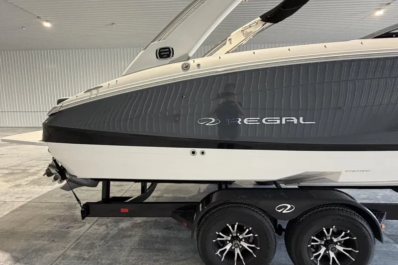 Slide: The Image of 2019 Regal LS6 boat on trailer in indoor storage facility. - 6