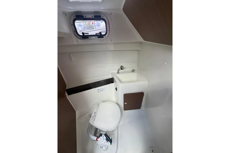 Slide: The Image of Bathroom interior of 2019 Beneteau Antares 23 boat with sink and toilet. - 22