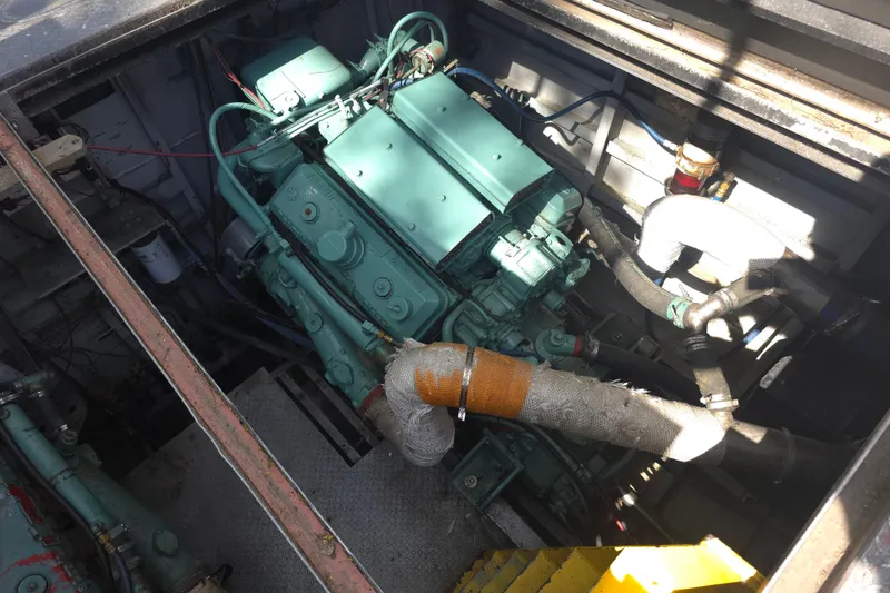 Slide: The Image of Engine compartment of 1974 Breaux's Bay Craft Passenger with COI boat. - 12
