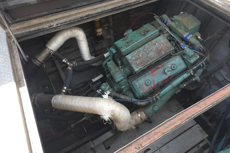 Slide: The Image of Engine compartment of a 1974 Breaux's Bay Craft Passenger with COI boat. - 13