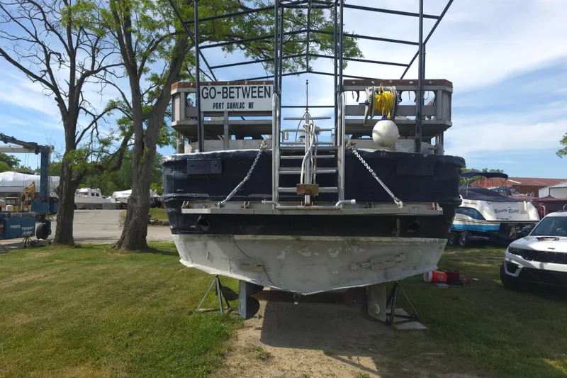 Slide: The Image of 1974 Breaux's Bay Craft passenger boat "Go-Between" on land, Port Sanilac, Michigan. - 5