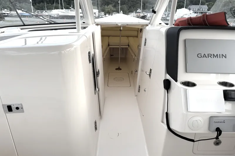 Slide: The Image of 2020 Grady-White Freedom 325 boat interior with Garmin navigation system. - 5