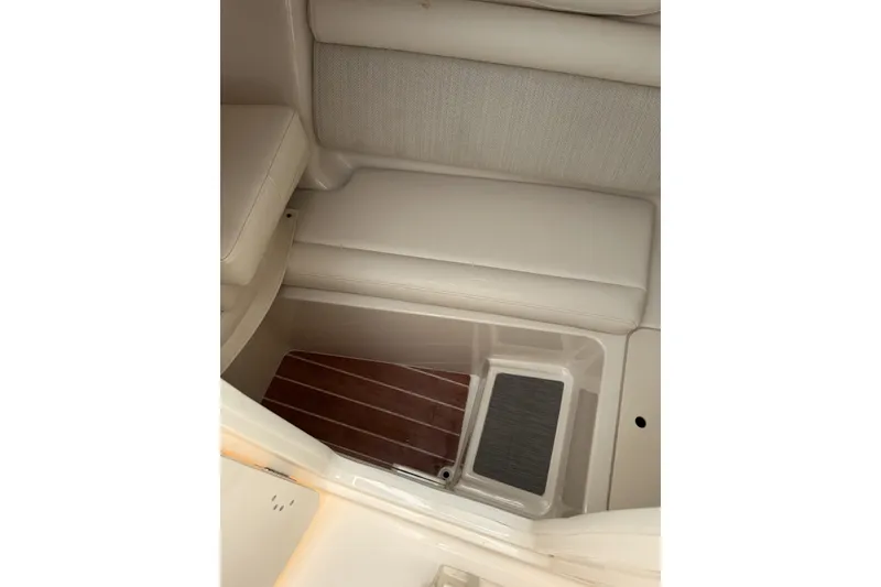 Slide: The Image of 2020 Grady-White Freedom 325 interior seating and storage area. - 6