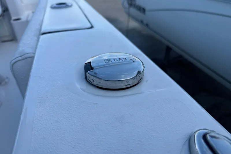 Slide: The Image of Fuel cap on 2022 Sportsman Open 232 Center Console boat deck. - 43