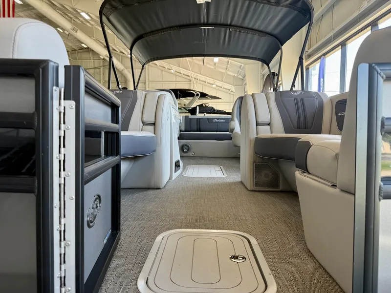 Slide: The Image of Interior of a Barletta Corsa 23UC pontoon boat with gray seating and carpeted floor. - 27