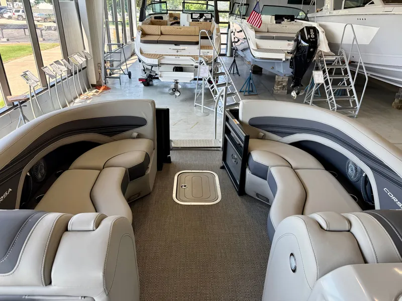 Slide: The Image of Interior of a 2025 Barletta Corsa 23UC with luxurious gray seating. - 15