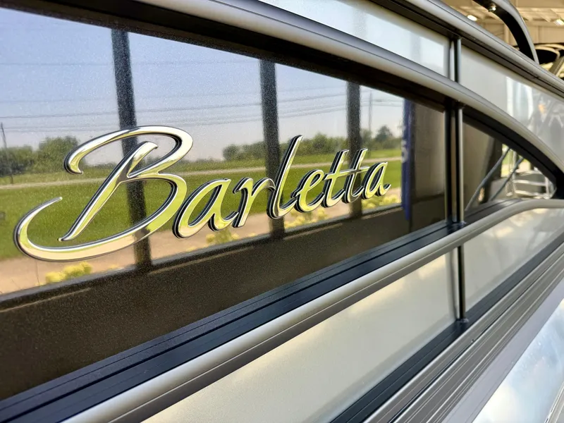 Slide: The Image of Close-up of the Barletta logo on a 2025 Corsa 23UC. - 25