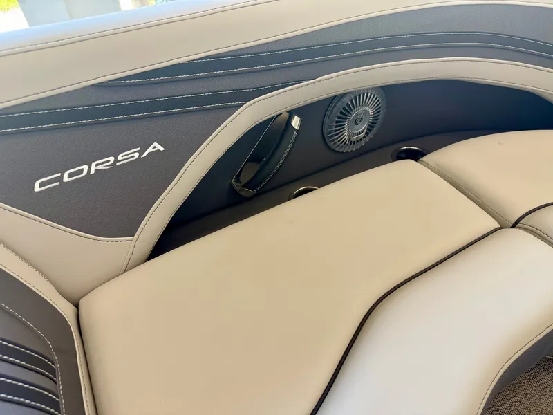 Slide: The Image of The image shows the sleek interior of a 2025 Barletta Corsa 23UC. - 22