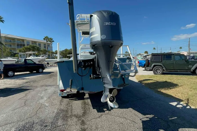 Slide: The Image of An Aquasport 2400 Center Console boat on a trailer. - 49