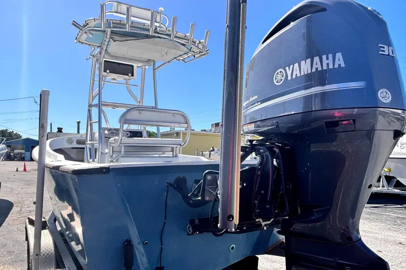 Slide: The Image of 1974 Aquasport 2400 Center Console boat with Yamaha 300 outboard motor. - 8
