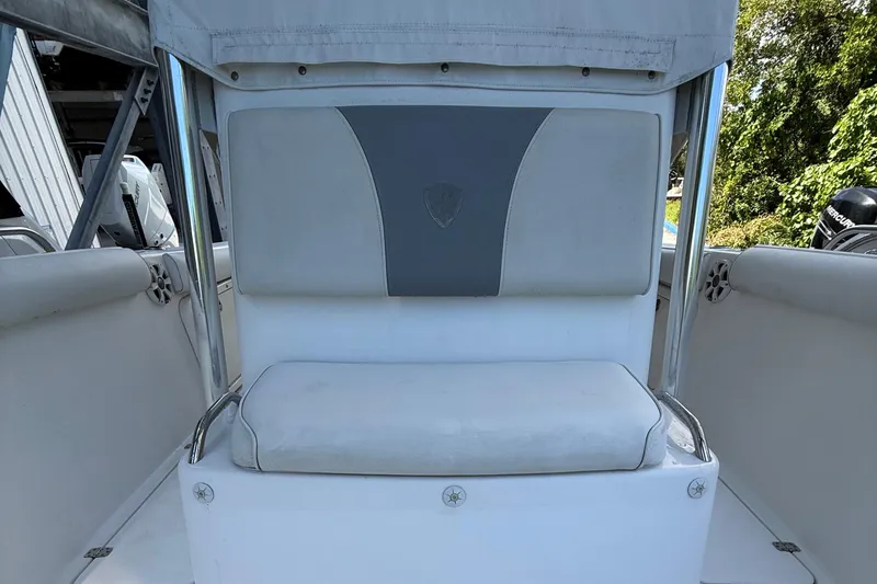 Slide: The Image of 2008 Century 2901 Center Console boat seat with gray and white upholstery. - 18