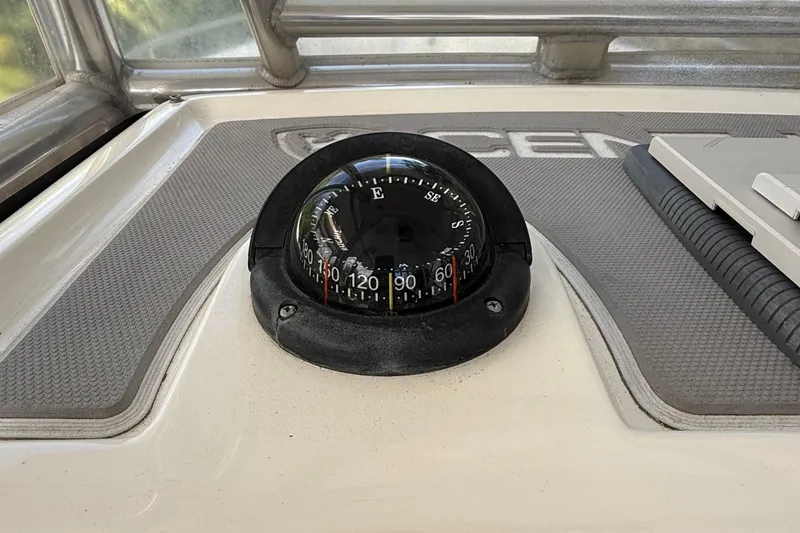 Slide: The Image of Compass on 2008 Century 2901 Center Console boat dashboard. - 41