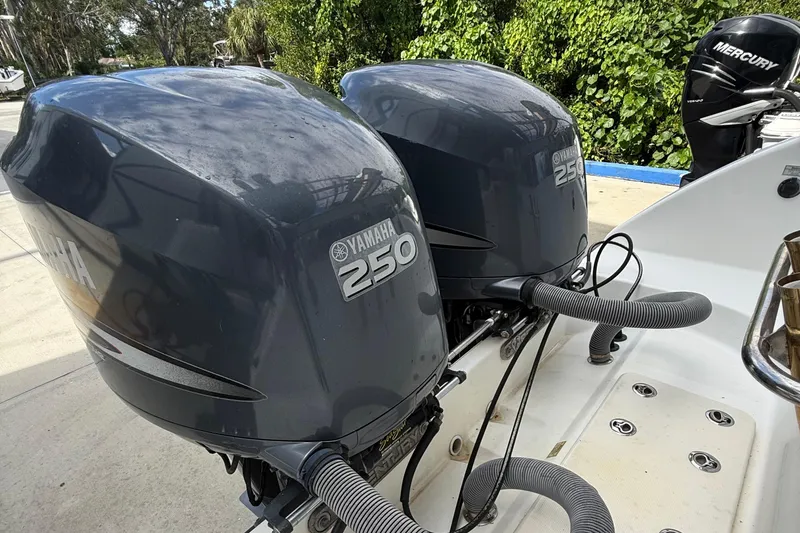 Slide: The Image of Twin Yamaha 250 outboard engines on a 2008 Century 2901 Center Console boat. - 54