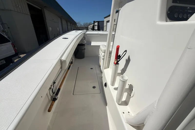 Slide: The Image of 2019 Calcutta 263 boat interior with rod holders and storage compartments. - 39